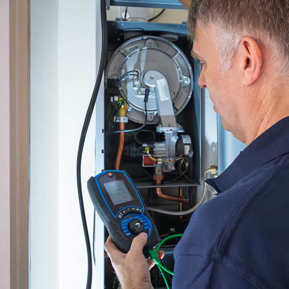 central heating engineer in derby working in a home
